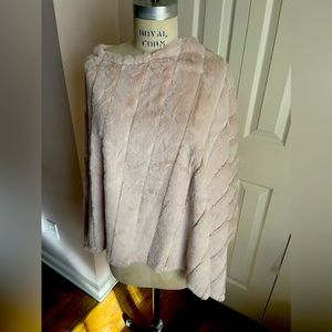 Beautiful faux fur tan poncho..never been worn